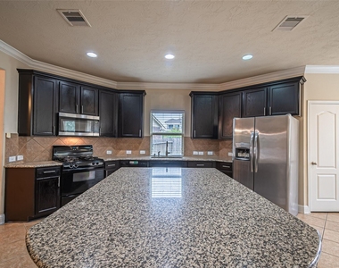 11507 Bermondsey Drive - Photo Thumbnail 12