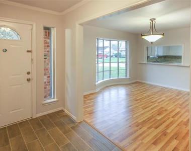 10534 Huntington Wood Drive - Photo Thumbnail 2
