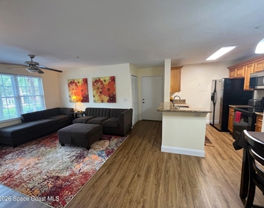 7667 N Wickham Road - Photo Thumbnail 2