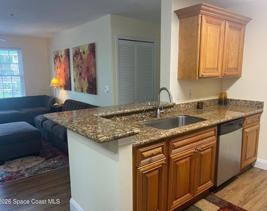7667 N Wickham Road - Photo Thumbnail 3