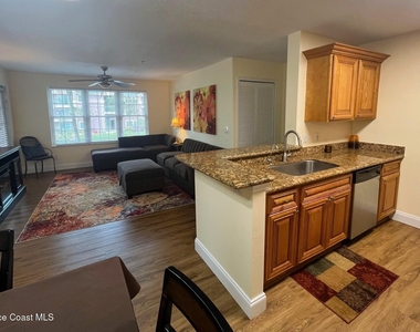 7667 N Wickham Road - Photo Thumbnail 1
