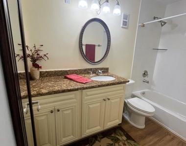 7667 N Wickham Road - Photo Thumbnail 5