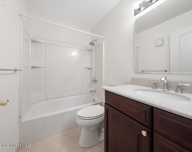 7667 N Wickham Road - Photo Thumbnail 15
