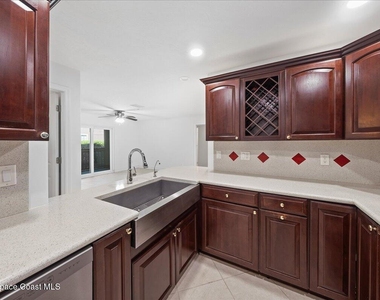 7667 N Wickham Road - Photo Thumbnail 4