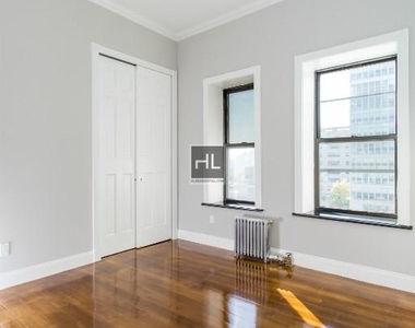 E 102nd St. - Photo Thumbnail 3
