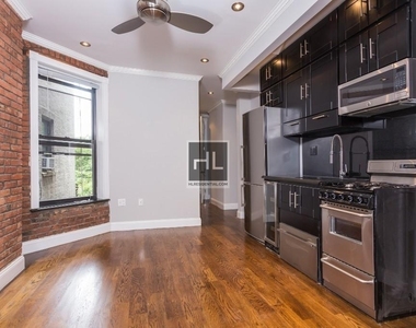 W 103rd St. - Photo Thumbnail 3