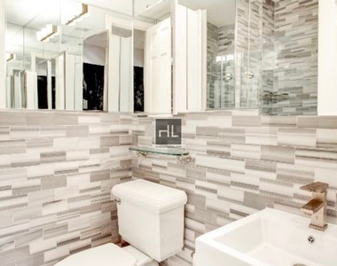 W 103rd St. - Photo Thumbnail 2