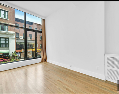 East 27 Street - Photo Thumbnail 3