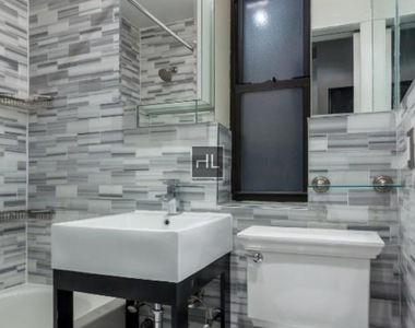 W 103rd St. - Photo Thumbnail 1