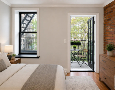 East 7 Street - Photo Thumbnail 2