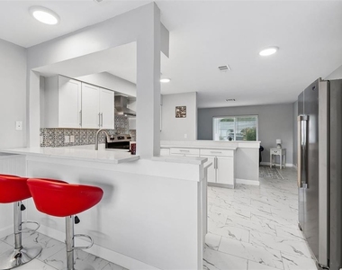 8120 Brown Pelican Avenue - Photo Thumbnail 3