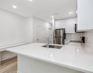 915 E 15th Avenue - Photo Thumbnail 14