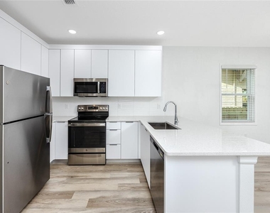 915 E 15th Avenue - Photo Thumbnail 17