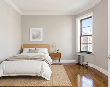 334 East 100th Street - Photo Thumbnail 3