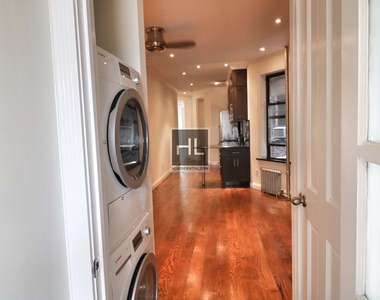 E 102nd St. - Photo Thumbnail 3