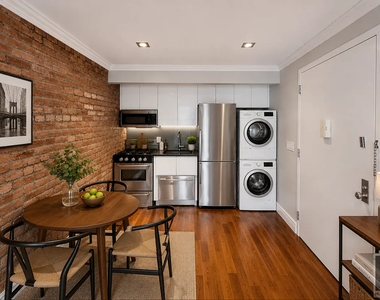 East 5 Street - Photo Thumbnail 1