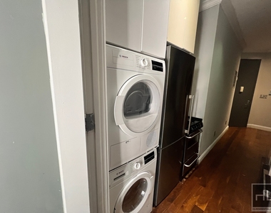 East 116 Street - Photo Thumbnail 3