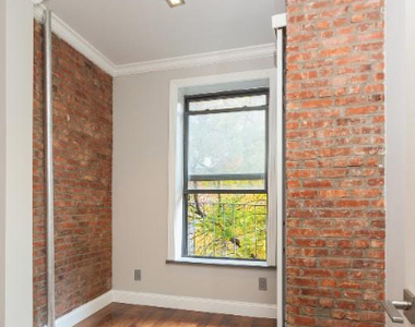East 116 Street - Photo Thumbnail 2