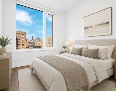 E 23rd St - Photo Thumbnail 4