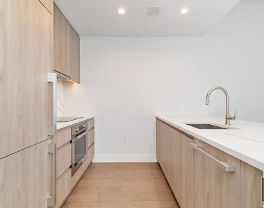E 23rd St - Photo Thumbnail 2