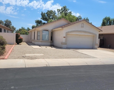 8817 N 65th Drive - Photo Thumbnail 1