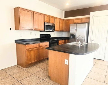 9915 W Wier Avenue - Photo Thumbnail 2