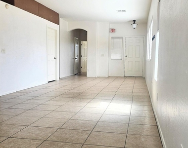 9915 W Wier Avenue - Photo Thumbnail 6