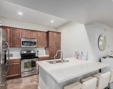 3935 E Rough Rider Road - Photo Thumbnail 1