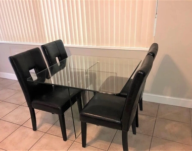 4411 E Tradewinds Avenue - Photo Thumbnail 4