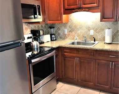 4411 E Tradewinds Avenue - Photo Thumbnail 5