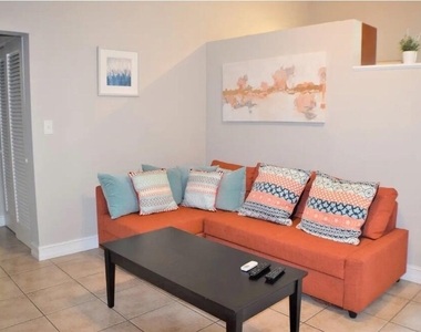 4411 E Tradewinds Avenue - Photo Thumbnail 1