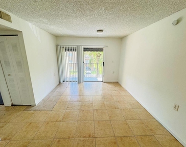 1068 N Benoist Farms Road - Photo Thumbnail 1