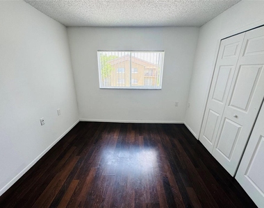 1068 N Benoist Farms Road - Photo Thumbnail 3