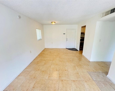 1068 N Benoist Farms Road - Photo Thumbnail 10