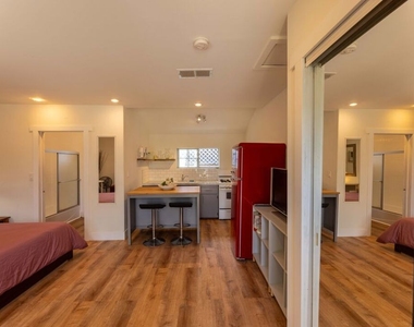 12835 Delano Street - Photo Thumbnail 2