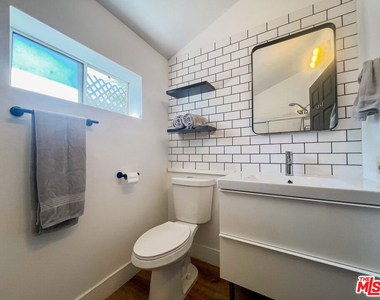 12835 Delano Street - Photo Thumbnail 10