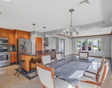 1072 Hicksville Road - Photo Thumbnail 3