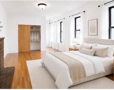 314 W 52nd Street - Photo Thumbnail 2