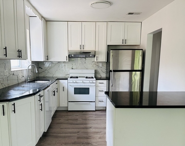 8638 Trumbull Avenue - Photo Thumbnail 3