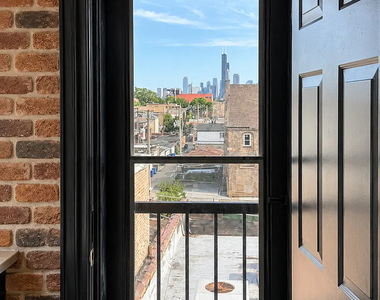 238 W 31st Street - Photo Thumbnail 5