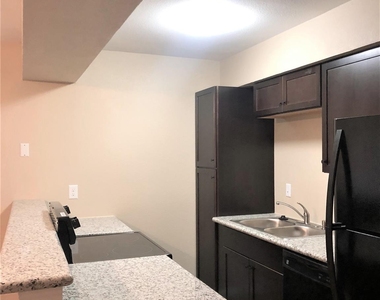 704 Ave B - Photo Thumbnail 3