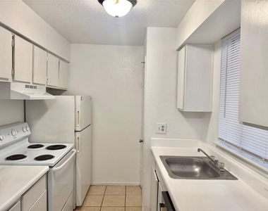 9201 Clarewood Drive - Photo Thumbnail 2