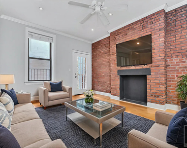 East 7 Street - Photo Thumbnail 2