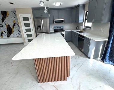 10708 Donbrese Avenue - Photo Thumbnail 19