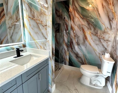 10708 Donbrese Avenue - Photo Thumbnail 32