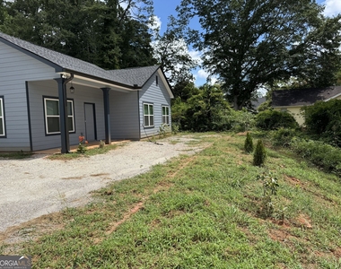 1555 W Poplar Street - Photo Thumbnail 1