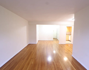 98-30 67th Avenue - Photo Thumbnail 1