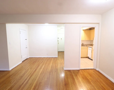 98-30 67th Avenue - Photo Thumbnail 3