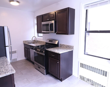 98-30 67th Avenue - Photo Thumbnail 6