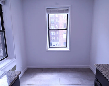 98-30 67th Avenue - Photo Thumbnail 3